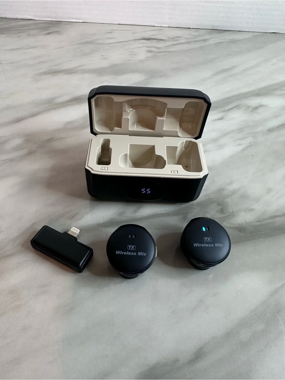 Wireless Earbud Charging Case with Three Black Earbuds